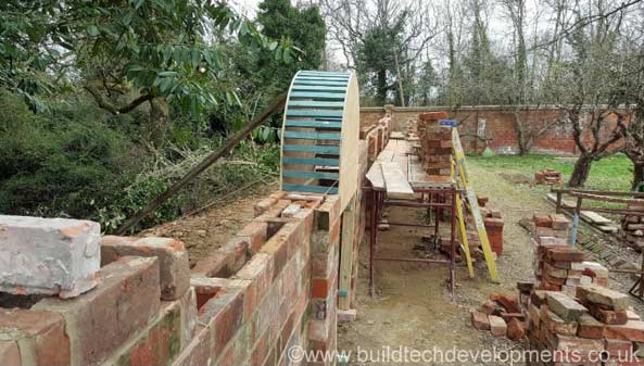 building of the wall arch