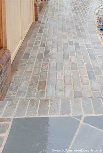 sandstone cobbles laid in entrance way