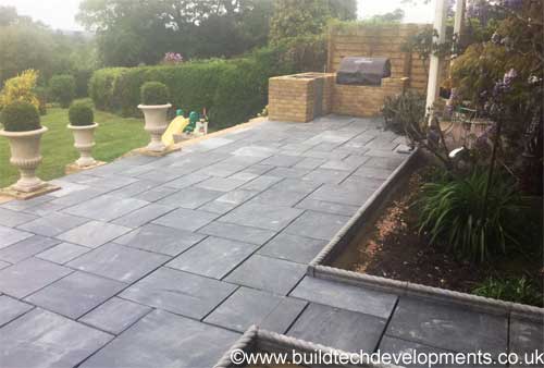 patio with steps into the garden